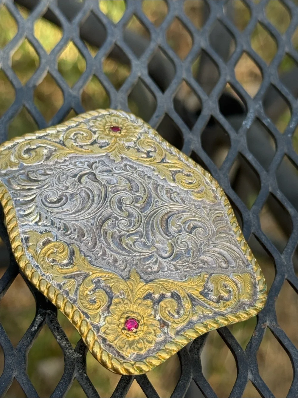 vintage rare garnet Crumrine Manufacturing belt buckle, produced in Reno, Nevada